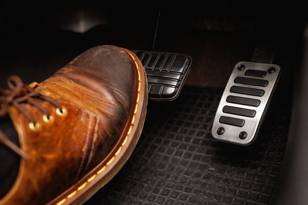 foot on accelerator pedal class five driving school lesson